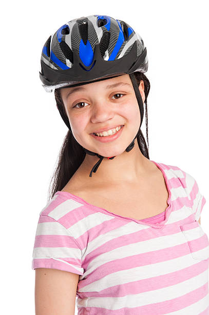 gemischtes teenager-mädchen mit fahrrad helm. - cycling helmet cycling sports helmet isolated stock-fotos und bilder
