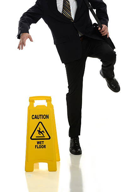 istock Businessman Slipping on Wet Floor 511437093