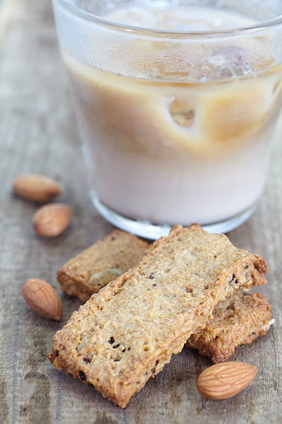 istock Almonds cookies and cup of milk tea 511438707