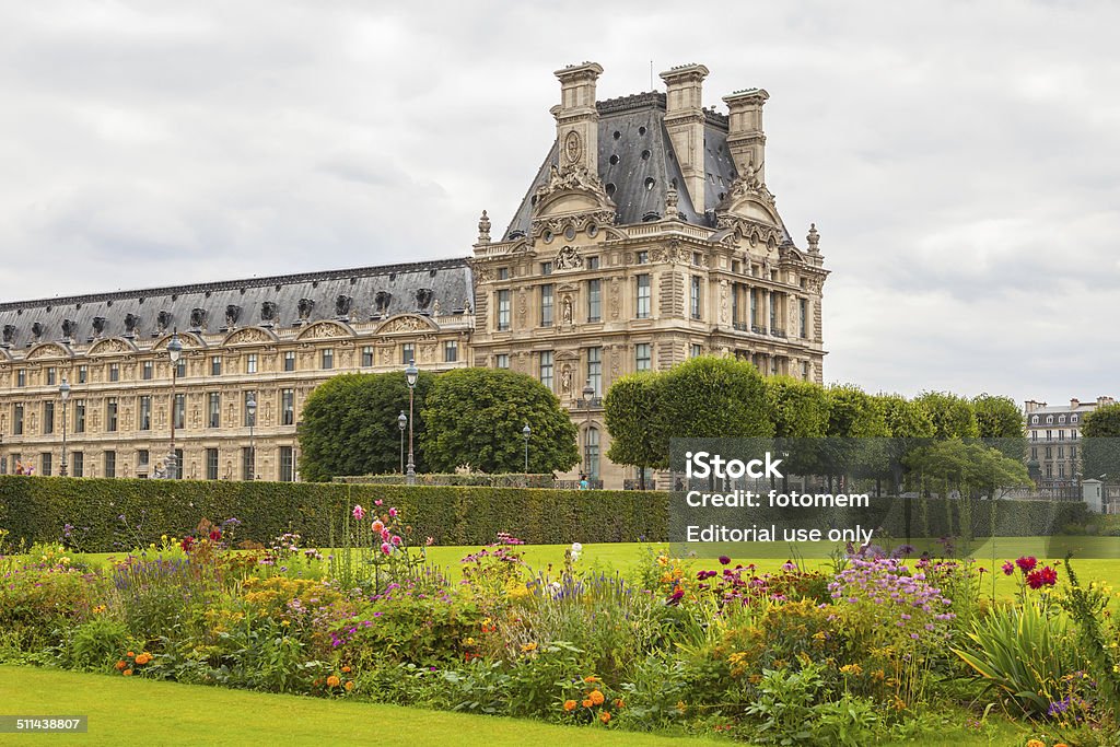 Tuileries Paris, France - July 15, 2014: Famous Tuileries garden (Jardin des Tuileries). Beautiful and popular public garden located between the Louvre Museum and the Place de la Concorde. Paris, France. Arranging Stock Photo