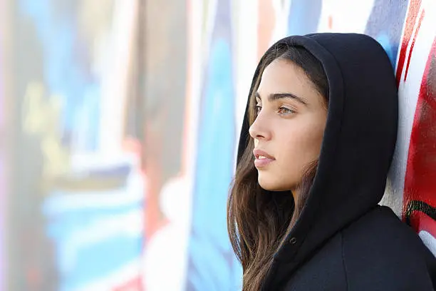 Photo of Profile portrait of a skater style teenager girl