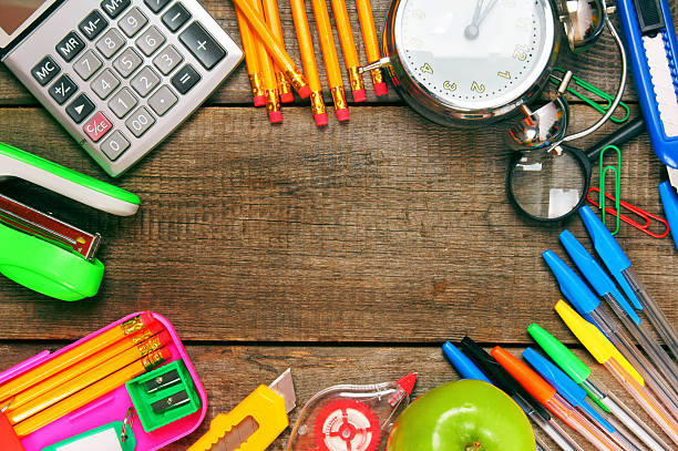 istock Back to school. School tools around. Wooden background. 511439349