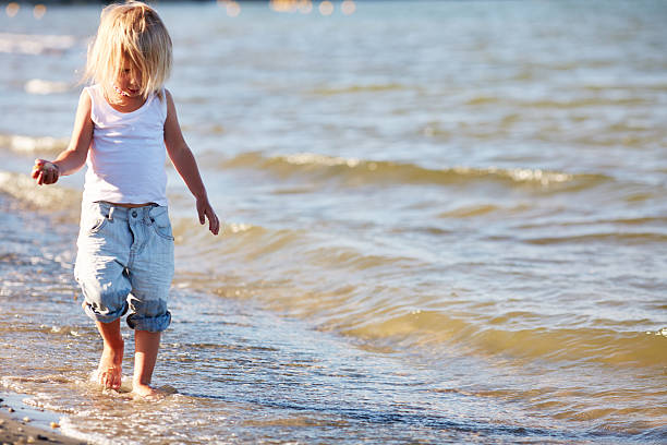 istock Girl at sea 511441065