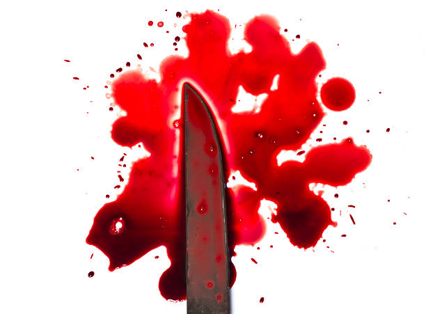 istock Pool (puddle, stains, droplets) of blood and knife blade 511441493