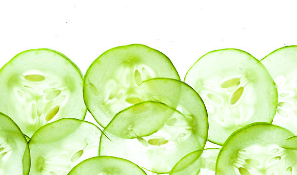 istock Fresh Cucumber and slices white background 511441827