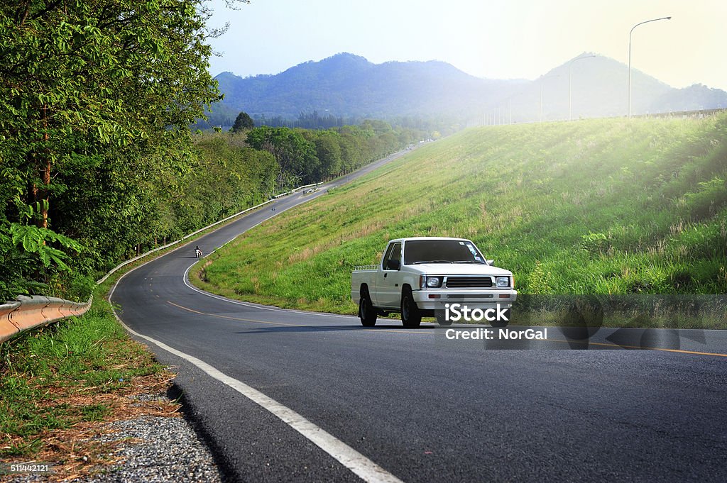 road a truck running on the road Pick-up Truck Stock Photo