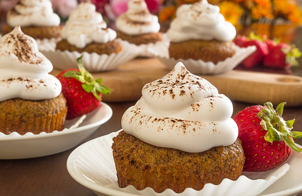istock spice cupcake with whipped cream and fresh strawberry 511443177