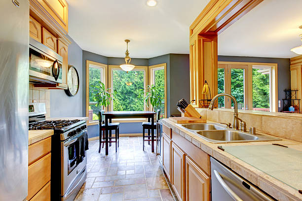 istock Nice large beautiful wood  kichen with grey walls. 511458134