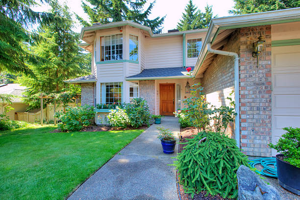 istock Beautiful yard filled with greenery and flowers. 511458154