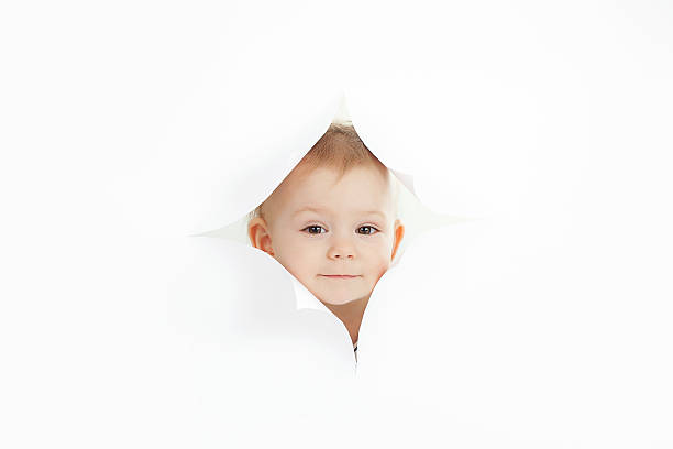 istock Cute baby boy against white background 511458792