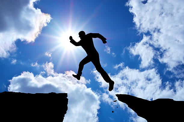 istock Man jump through the gap. Element of design. 511459408