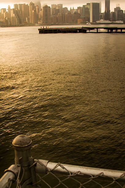 Manhattan Fence on Dock at Sunset stock photo