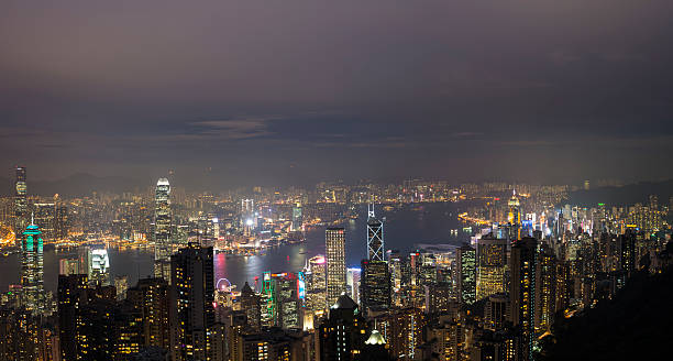 istock Hong Kong Skyline Harbour Illuminated at Twilight Vertical 511461200