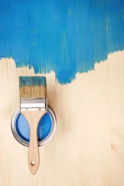 Photo of Paint brush on the can