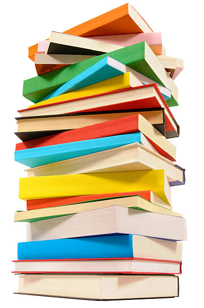 istock Very tall pile of books isolated on white background 511463390