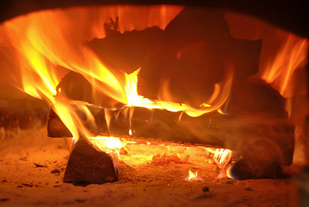 Traditional italian Pizza oven, burning wood and flames in fireplace