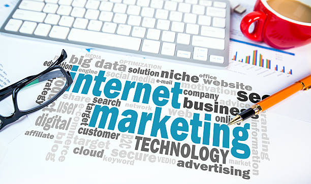 istock internet marketing word cloud on office scene 511464994