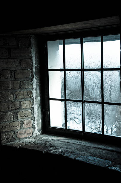 istock Old window on a cold and rainy day 511469148