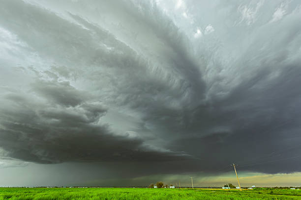 istock Huge US severe thunderstorm surges over farm buildings and powerlines 511471968
