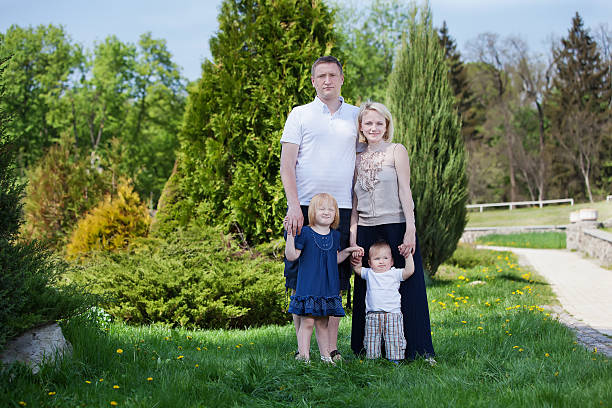 istock Happy family in the park 511472160