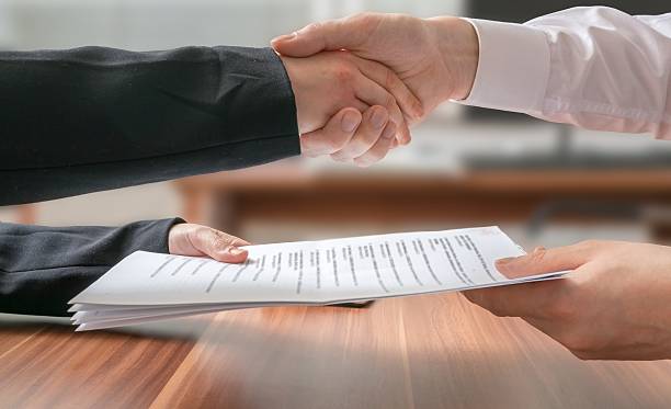 istock Partnership concept. Business man and woman shaking hands. 511472814