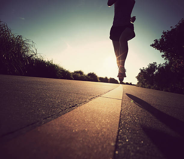 istock Runner athlete running at seaside road.vintage effect 511472882