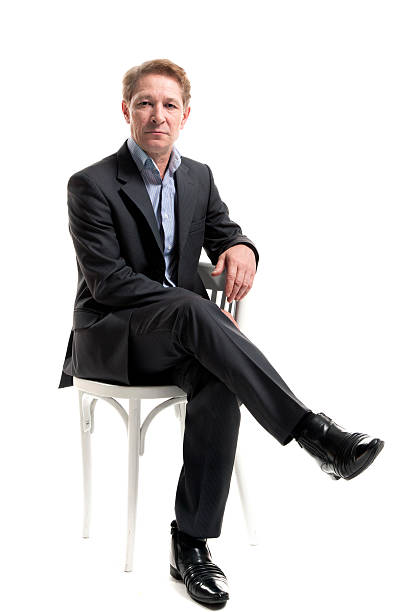 istock Businessman sitting on a chair 511474021