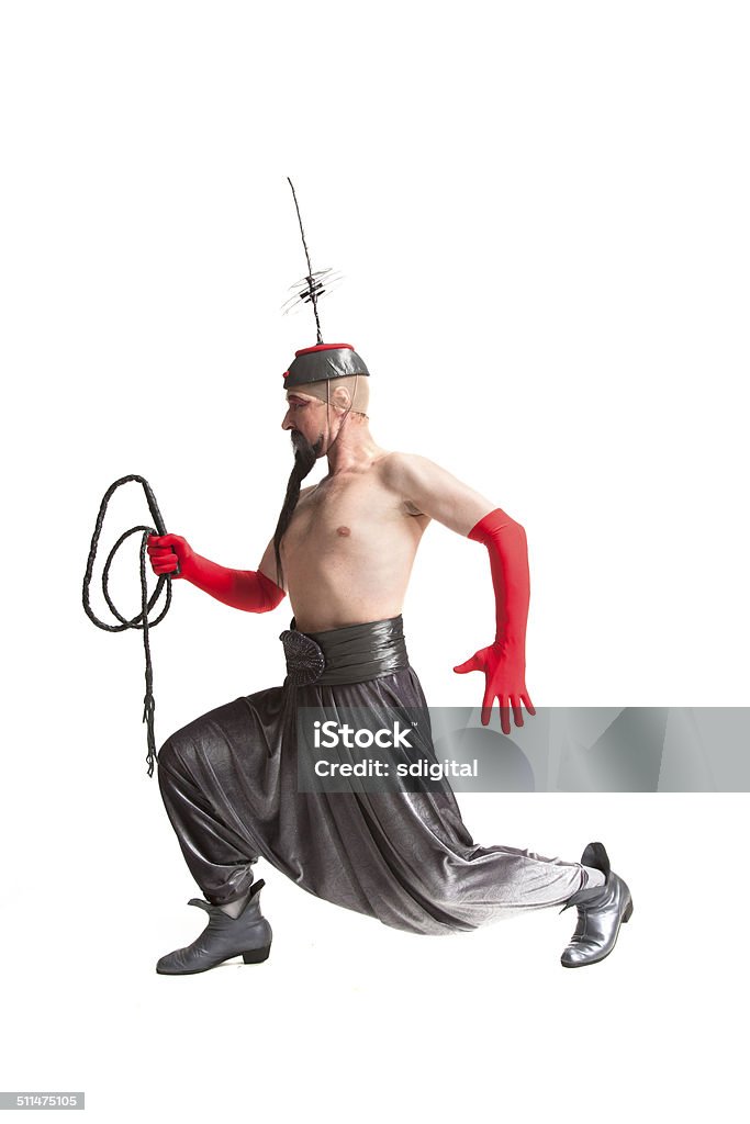 Man in a costume with a whip man in a costume for Halloween with a whip on white background 30-39 Years Stock Photo