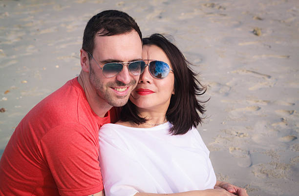 istock Happy romantic couple  enjoying on the beach , in holidays. 511475220