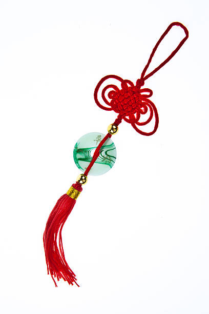 istock Chinese Traditional Knot with jade isolated on white background 511476664