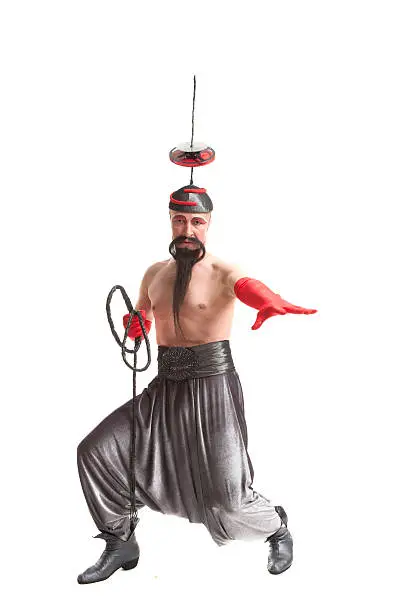 man in a costume for Halloween with a whip on white background