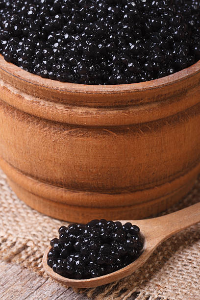 istock black sturgeon caviar in a wooden spoon macro 511479231