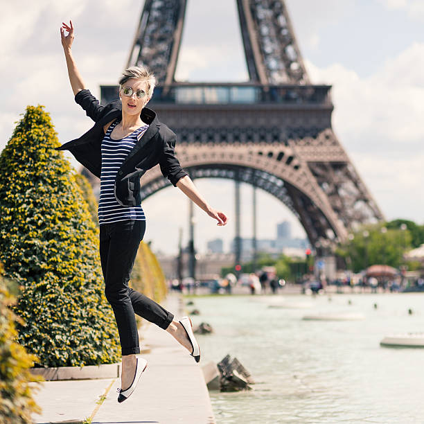 istock Young blonde woman portrait jumping. 511479603