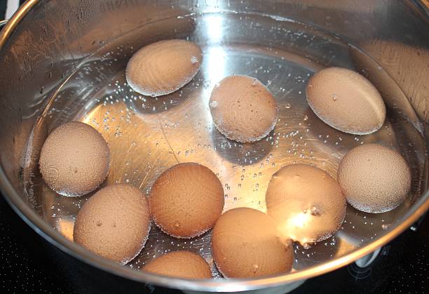 istock Eggs boiling in a pan of water 511481060