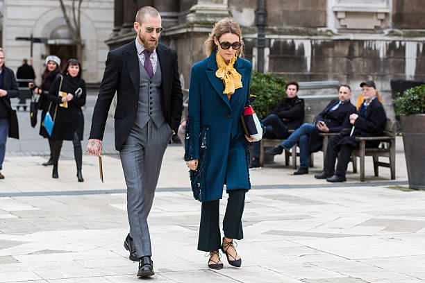 Guests attending Mulberry fashion show during London Fashion Week AW16 London, United Kingdom - February 21, 2016: Guests attending Mulberry fashion show during London Fashion Week Autumn Winter 2016. london fashion week stock pictures, royalty-free photos & images