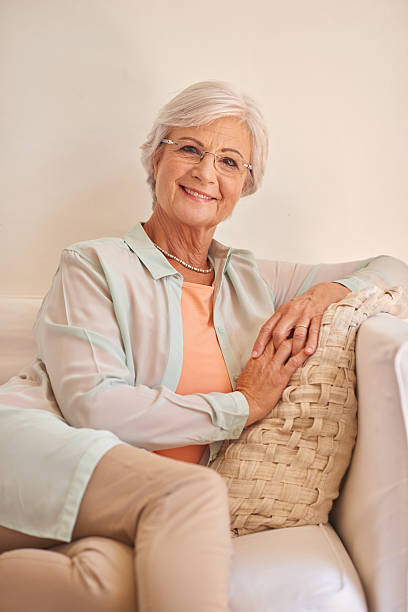 istock Pretty senior woman sitting at home and thinking about something 511483242