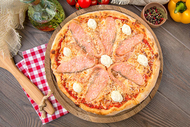 istock Italian pizza with salmon and cream cheese 511484932