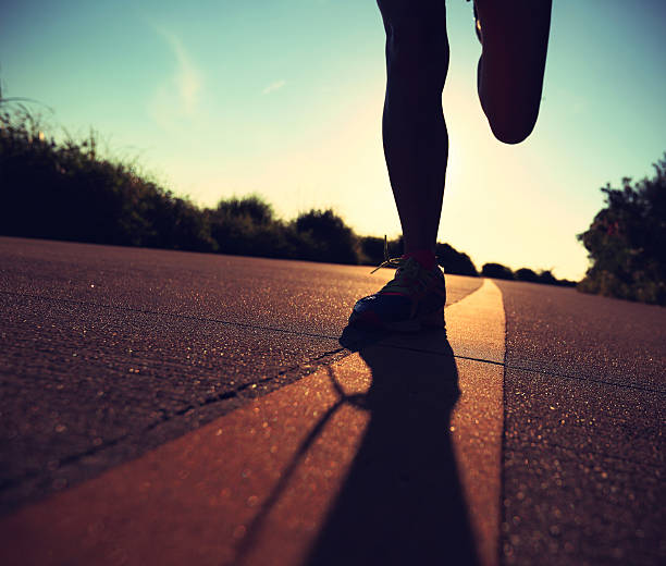 istock Runner athlete running at seaside road.vintage effect 511485302