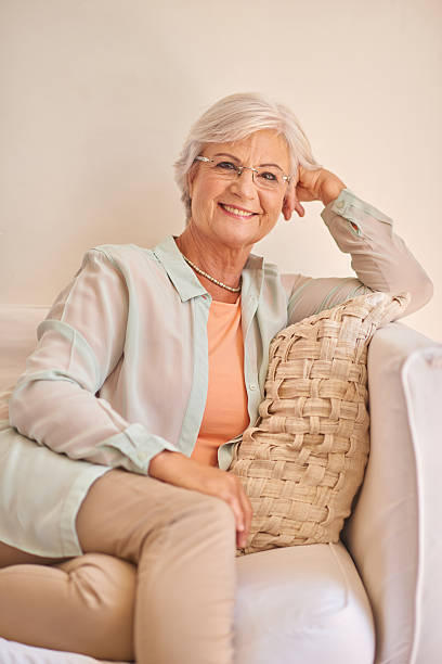 istock Pretty senior woman sitting at home and thinking about something 511486242