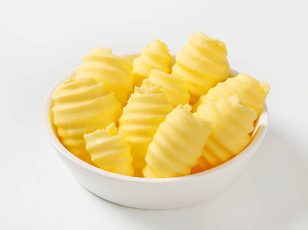 istock Bowl of butter curls 511487244