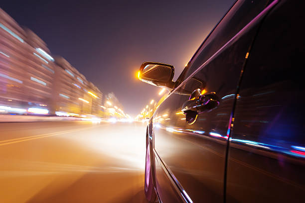 car on the road with motion blur background stock photo