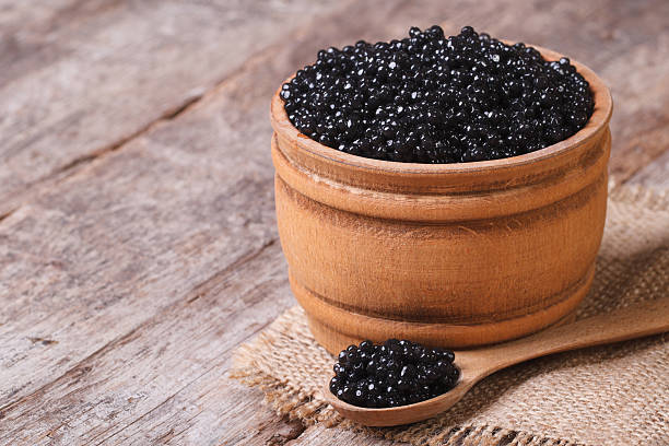 istock black sturgeon caviar in a wooden a barrel 511501807