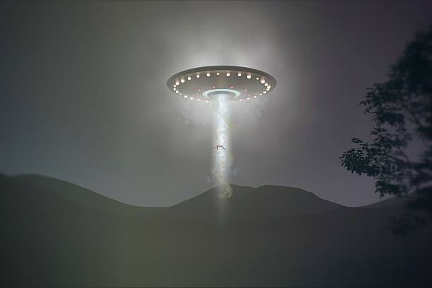 ufo abduction stock photo
