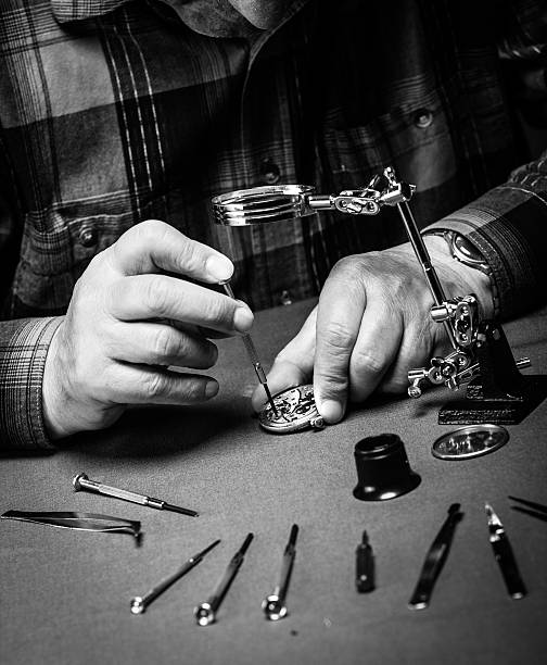 istock Repairing old pocket watch 511503679