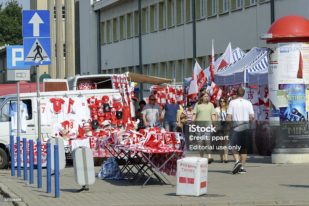 Polish fans accessories Wroclaw, Poland - September 7, 2014: Polish fans accessories stand in front of the sports hall during the European Championship in volleyball in Wroclaw. Business Stock Photo