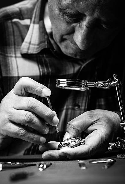 istock Repairing old pocket watch 511509135