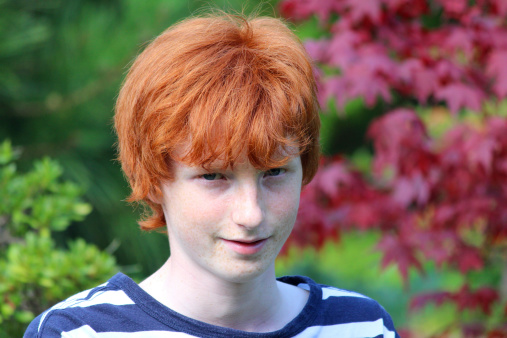 Teenage Boy Wearing Stripy Top Red Hair Smiling In Garden Stock Photo -  Download Image Now - iStock