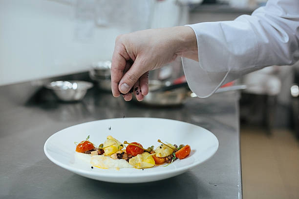 istock Chef preparing food in the kitchen 511514016