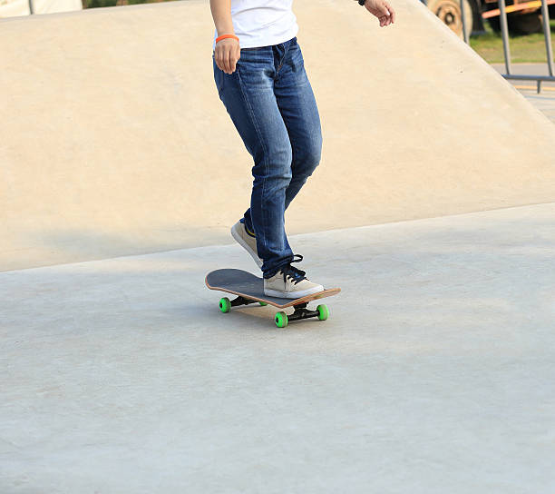 istock skateboarding woman at skatepark 511516822