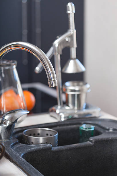 istock Kitchen sink and faucet 511518544
